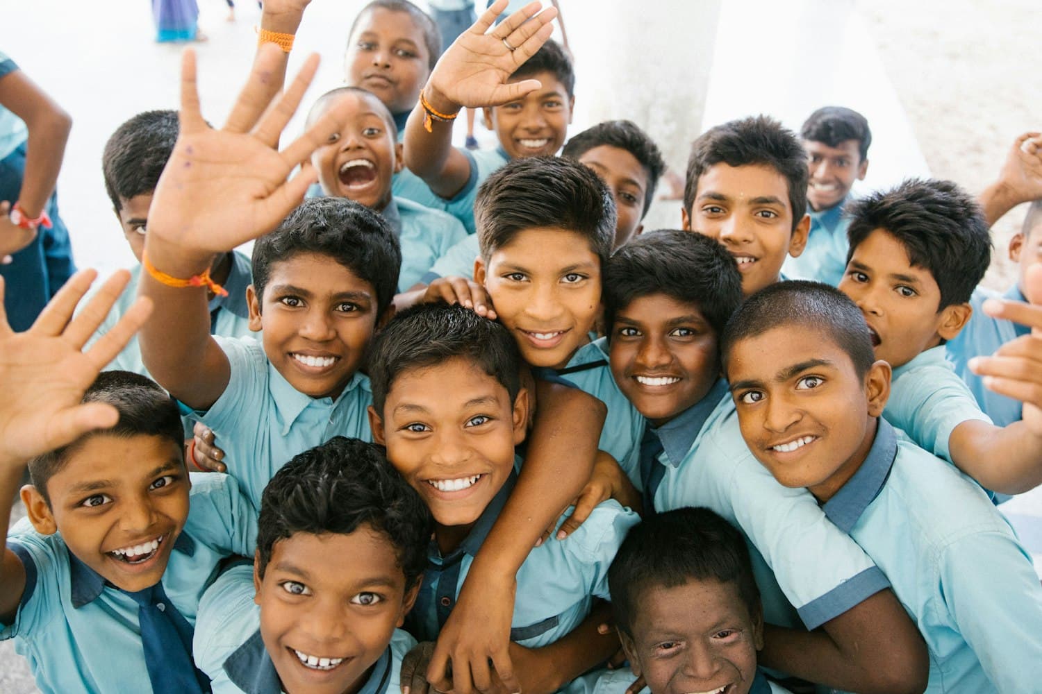A diverse, joyful group of schoolchildren